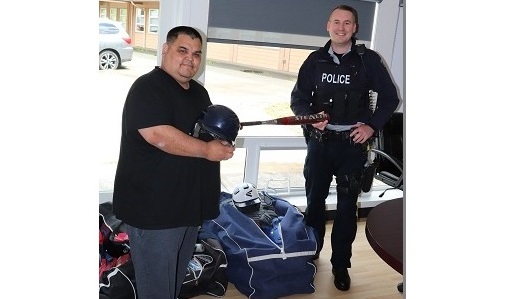 Port Hardy RCMP donate baseball equipment to Quatsino First Nations Band