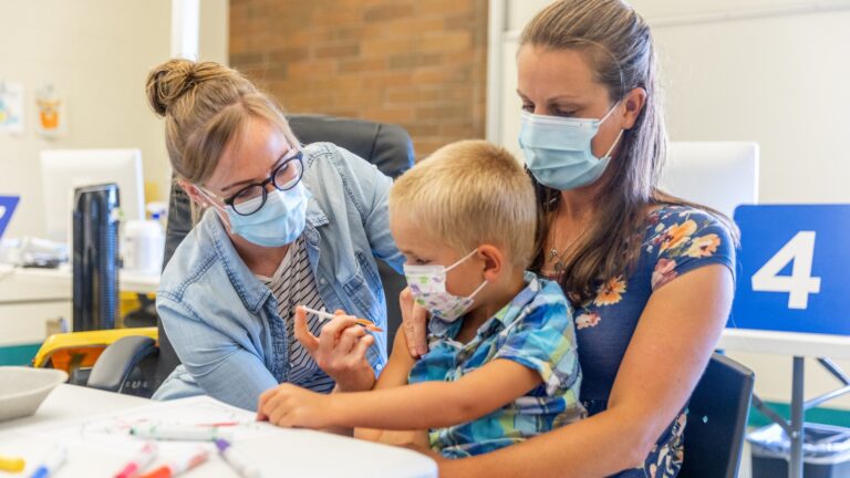 Photo of a child receiving a vaccination