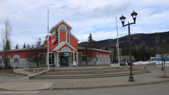 Tumbler Ridge Town Hall, with flags at half staff following a deadly shooting in the community (Darin Bain, My Prince George Now)